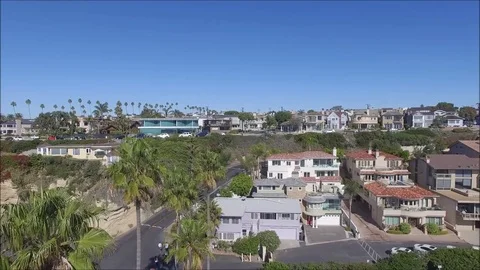Panoramic aerial view of Pacific Ocean and Corona del Mar beach and coastline Stock Footage 73854716