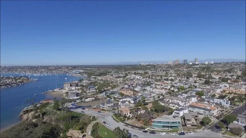 Panoramic aerial view of Pacific Ocean and Corona del Mar beach and coastline Stock Footage 73854788