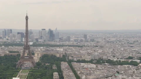 Panoramic aerial view of Paris cityscape with Eiffel Tower and La Defense Stock Footage 237925287