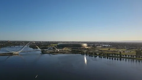 Panoramic aerial view Perth stadium and footbridge across Swan River Stock Footage 95084844