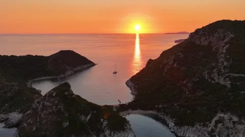 Panoramic Aerial View of Porto Timoni Twin Beach at Sunset in North Corfu Stock Footage 345388219