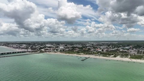 Panoramic aerial view of Progreso, Yucatán, on a bright day with large cloud Stock Footage 321503171