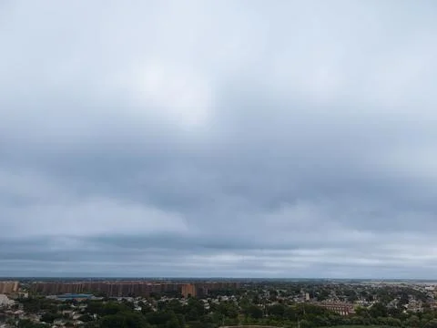 Panoramic aerial view of Queens rooftops, homes and tree-lined Jamaica area stre 스톡 사진