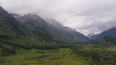 Panoramic aerial view of river valley near Stewart, British Columbia Video stock 153044743