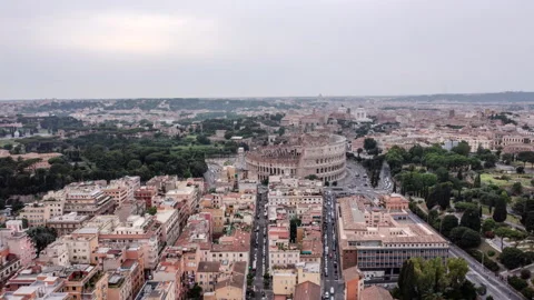 A Panoramic Aerial View Showcasing The Historic Roman Colosseum Surrounded By Stock Footage 297723817