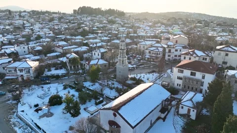 Panoramic aerial view of the snow covered village of Argalasti 스톡 동영상 265476359