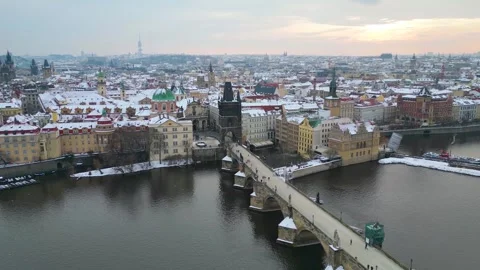 Panoramic aerial view of the snow covered skyline of Prague Video stock 266127280