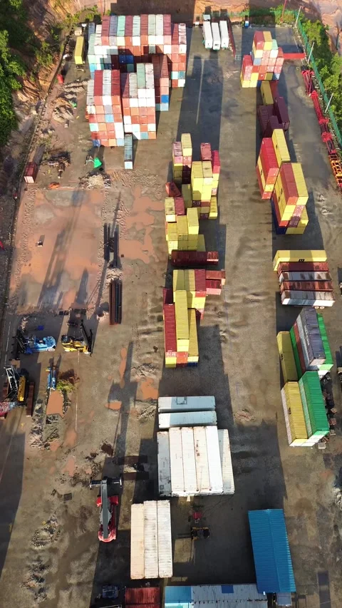 Panoramic aerial view of a sprawling intermodal freight terminal showcasing.. Stock Footage 337284397