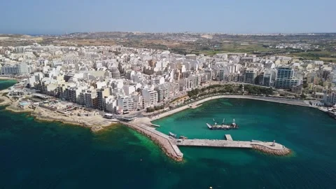 Panoramic aerial view of St Paul's Bay and Bugibba waterfront, Malta coast Stock Footage 339326801