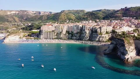 Panoramic Aerial View of Tropea's Stunning Waterfront and Historic Cliffs Stock Footage 321759272