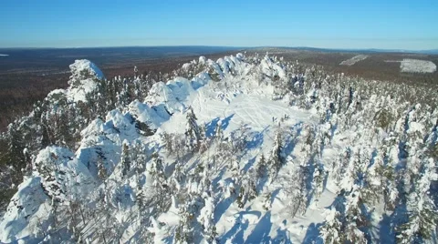 Panoramic aerial view upper mountain area in bright winter day Vidéo 61156420