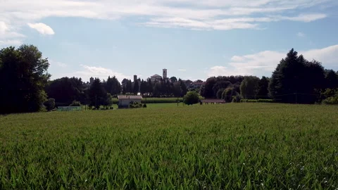 Panoramic aerial view of Vertemate con Minoprio town and cornfields Stock Footage 247322658