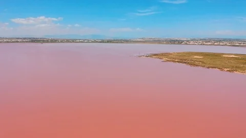 Panoramic aerial view video of Las Salinas, bright color famous place pink lake Stock Footage 107934080