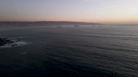 Panoramic aerial view of the waves overlooking the port of valparaiso Stock Footage 157449601