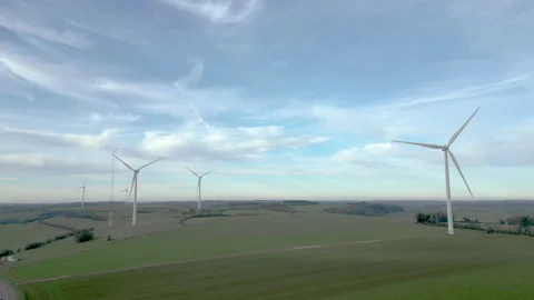 Panoramic aerial view of wind farm turbines rotating in January landscape. Stock Footage 296185001
