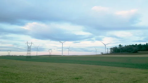 Panoramic aerial view of wind farm turbines rotating in January landscape. Stock Footage 296187243