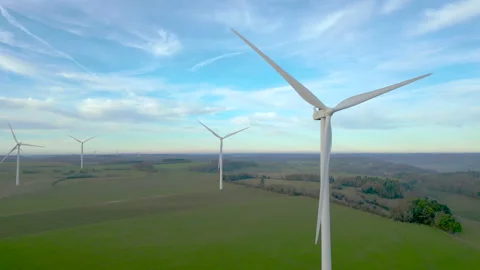 Panoramic aerial view of wind farm turbines rotating in January landscape. Stock Footage 296187409