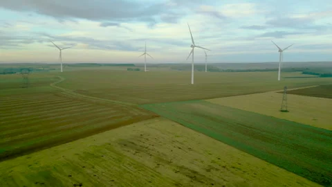 Panoramic aerial view of wind farm turbines rotating in January landscape. Stock Footage 296187487