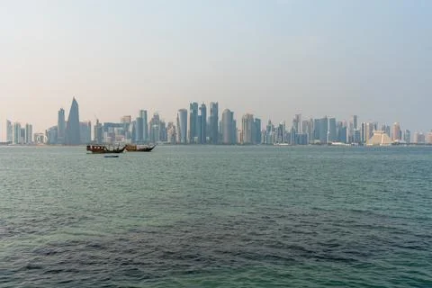 Panoramic afternoon view of the modern Doha West Bay skyline. Stock Photos