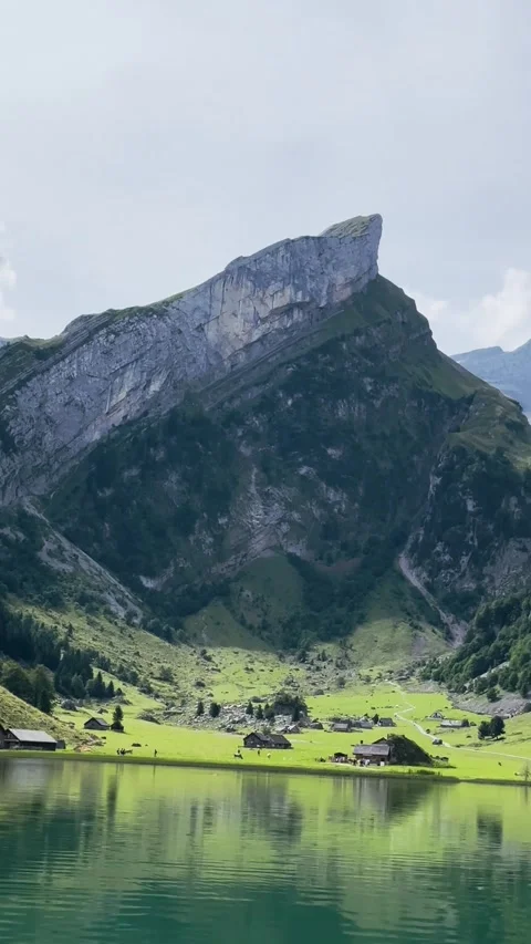 Panoramic Alpine Lake and Mountains Stock Footage 329446261