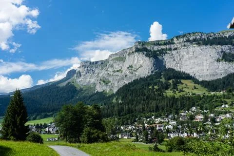 Panoramic alps mountain view with small city Stock Photos
