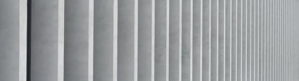 Panoramic architectural background with repeating concrete elements forming Stock Photos