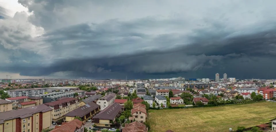 Panoramic Arcus cloud phenomenon, the storm clouds on sunset in June Stock Photos