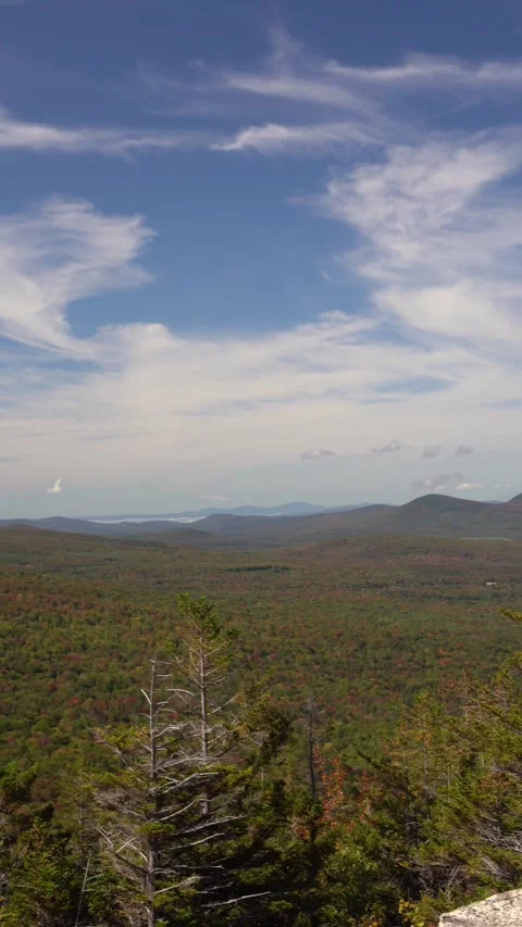 Panoramic autumn view pans across White Mountain National Forest New Hampshire Stock Footage 321506169