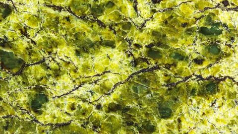 Panoramic background from polished lizardite Stock Photos