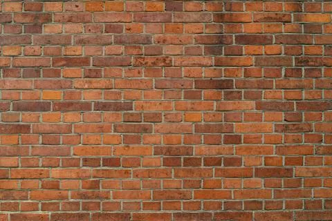 Panoramic background of wide old red brick wall texture. Home or office desig Stock Photos