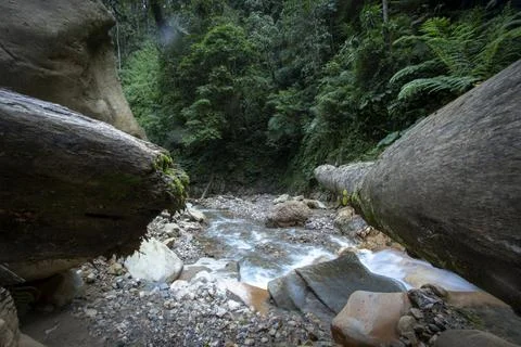 Panoramic beautiful deep forest waterfall in Indonesia Foto stock