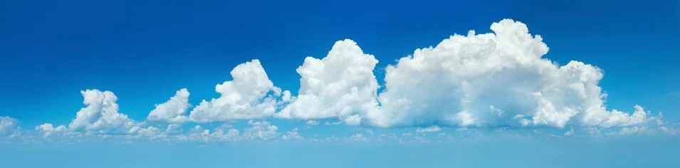 Panoramic Blue Sky with  light clouds banner background Stock Photos