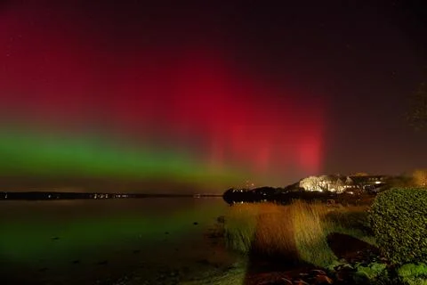 Panoramic bright Aurora Borealis Over Flensburg Fjord View from Solituede B.. Stock Photos
