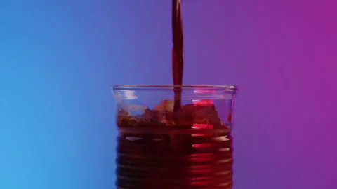 Panoramic camera move on a beautiful ribbed glass with cocktail of iced coffee Stock Footage 246385698