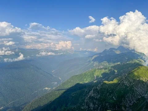 Panoramic Caucasus Mountain Range Under Dramatic Clouds Stock Photos
