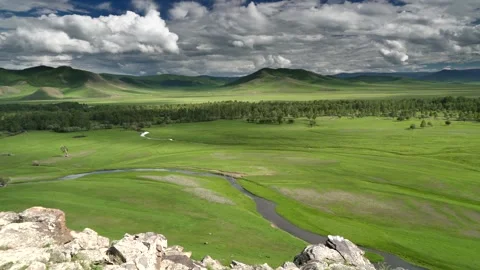 Panoramic cinematic Mongolia landscape shows winding river grassland mountains 스톡 동영상 333835181