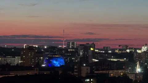 Panoramic cityscape from window at summer sunset Stock Footage 310444491