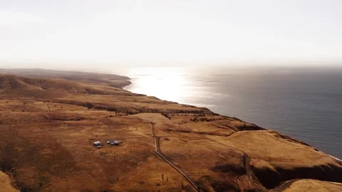 Panoramic Cliff Edge with Ocean Haze Beyond Stock Footage 327339398