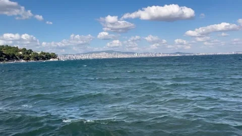 Panoramic Coastal View with Islands and Distant City Skyline Stock Footage 342355201