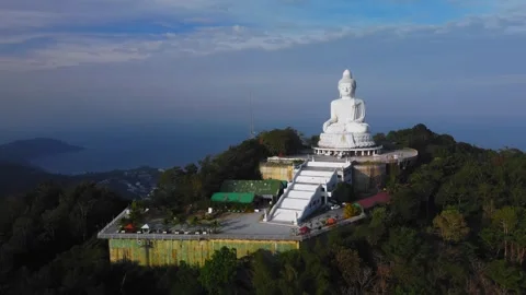 Panoramic coastal view of Phuket Big Buddha during golden hour filmed by drone Stock Footage 344085979