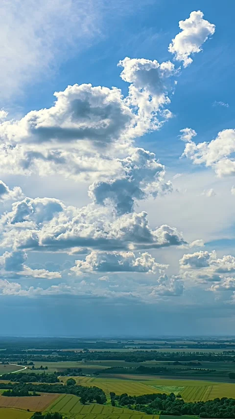 Panoramic Countryside Under Towering Clouds Vídeos de archivo 331112657