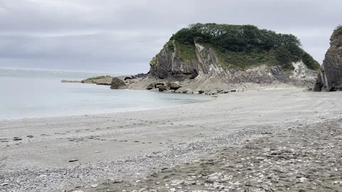 Panoramic deserted Beach shot in cloudy Devon Stock Footage 246475692