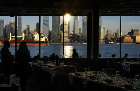 The panoramic dining room windows at the Chart House Restaurant Stock Photos