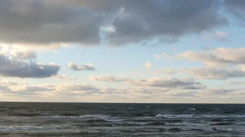 Panoramic dolly shot of winter sea with clouds time lapse Stock Footage 59160695
