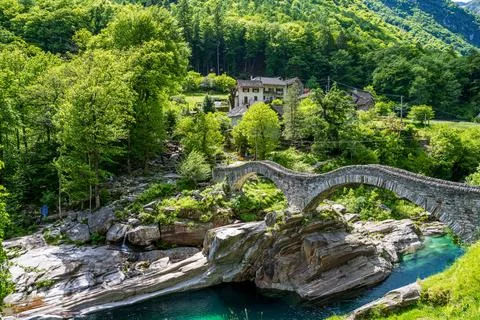 Panoramic Double arch stone bridge at Ponte dei Salti with waterfall, Laverte Stock Photos