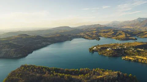 Panoramic dramatic view of Green Lake Manavgat with green hills and forests Stock Photos