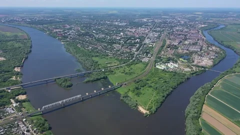 Panoramic drone ascent over city and river in Kolomna Stock Footage 327405735