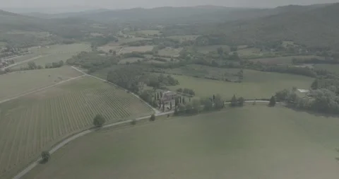 Panoramic Drone Flyby of Tuscan Villas, Vineyards and Cypress Hills in Italy Stock-Footage 343933060