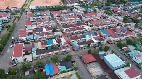 Panoramic Drone Footage Showcasing a Densely Populated Southeast Asian Town.. Video stock 339031205