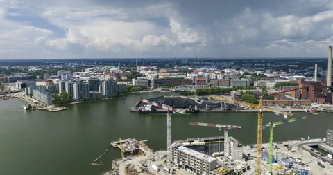 Panoramic drone hyperlapse construction and industrial work in Helsinki, summer Stock Footage 303035237